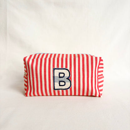 trousse con lettera applique