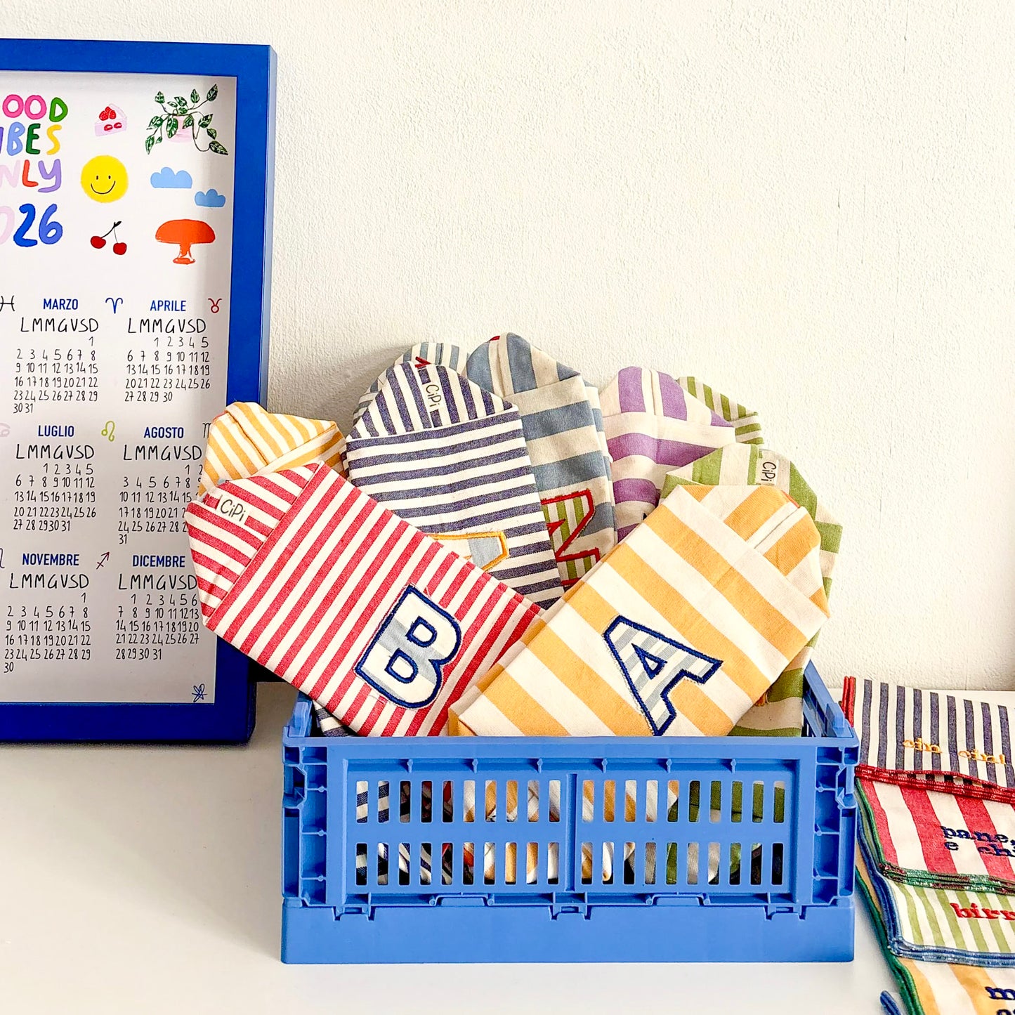 trousse con lettera applique